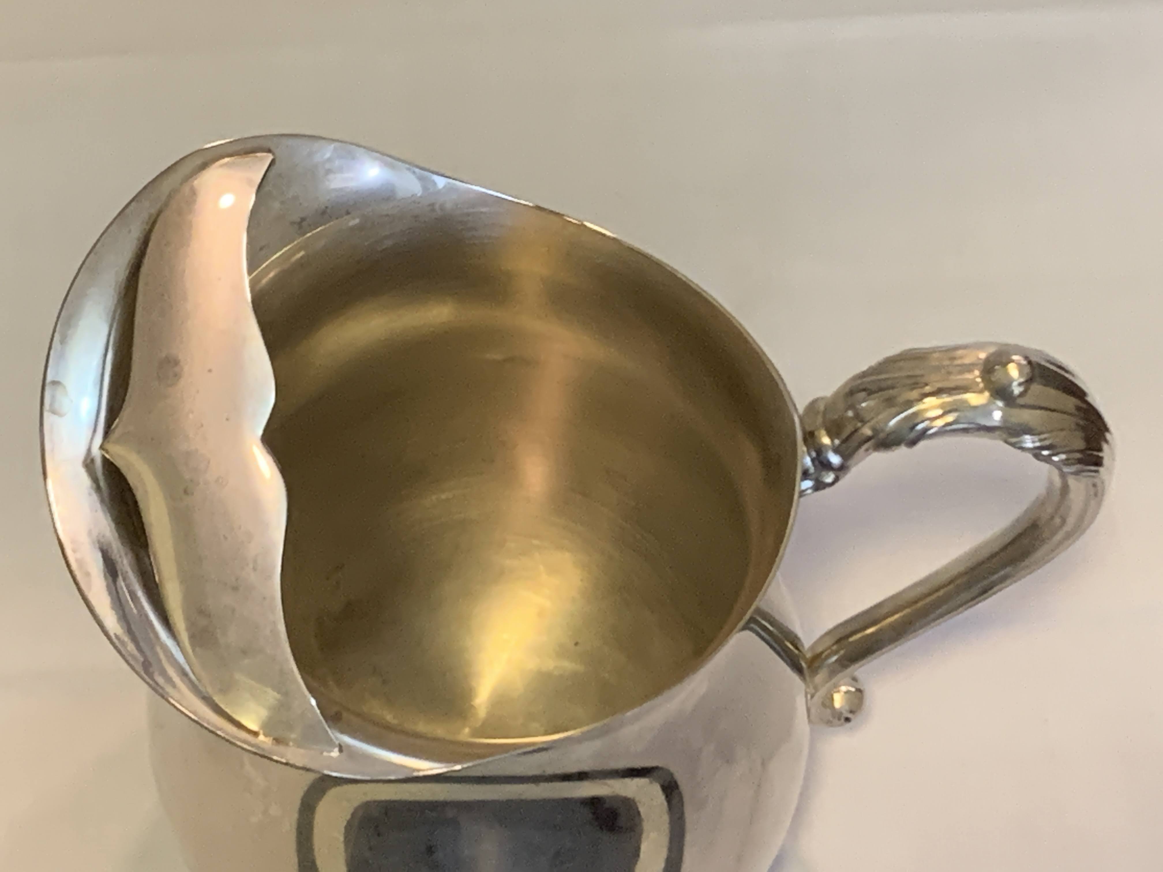 Silver Plated Mid century Pitcher with foot