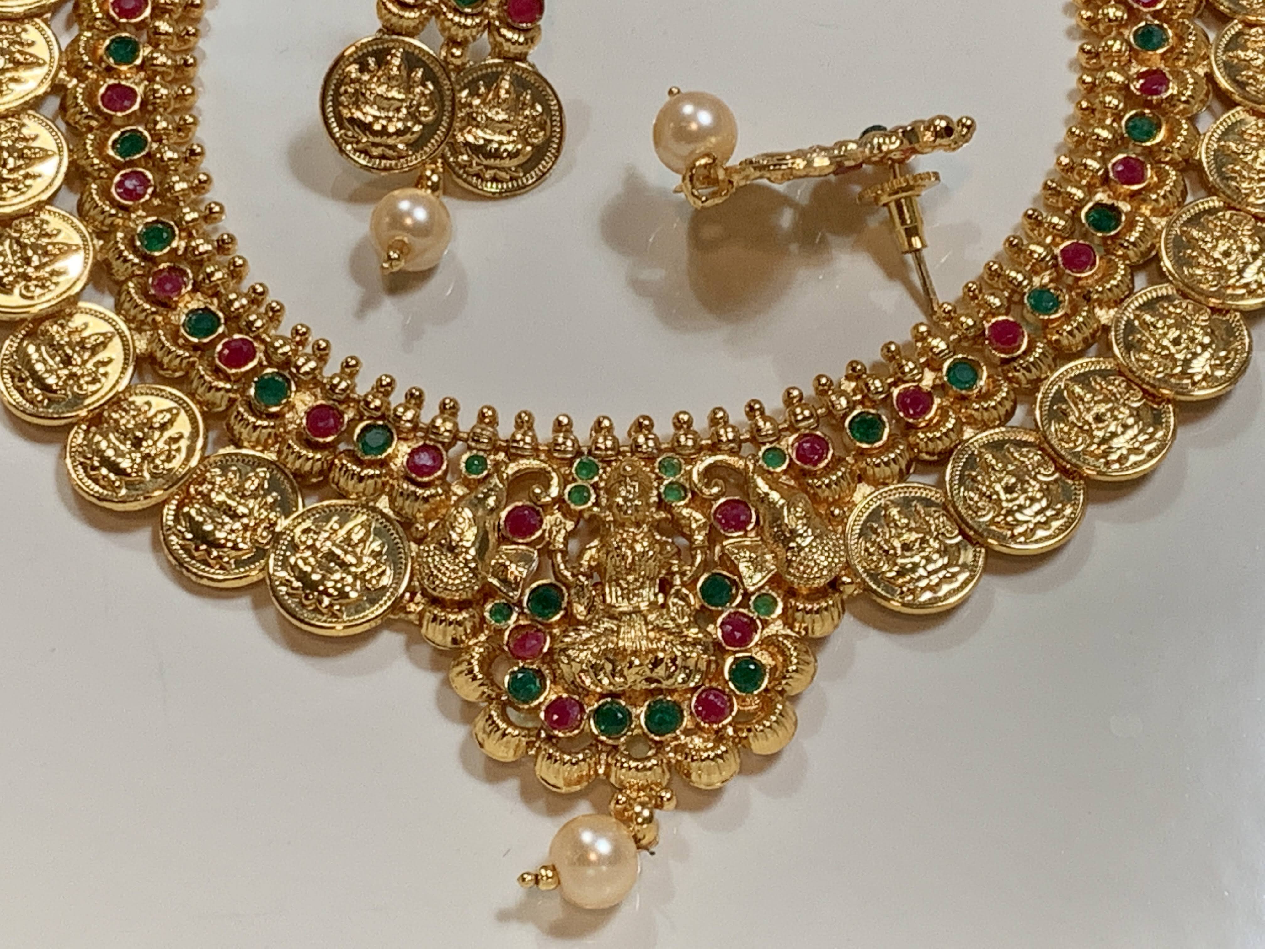 Goddess Lakshmi Pendant and Coins - Gold Plated Temple Jewelry - Pearl and Jewel Stone Studded Short Necklace Set